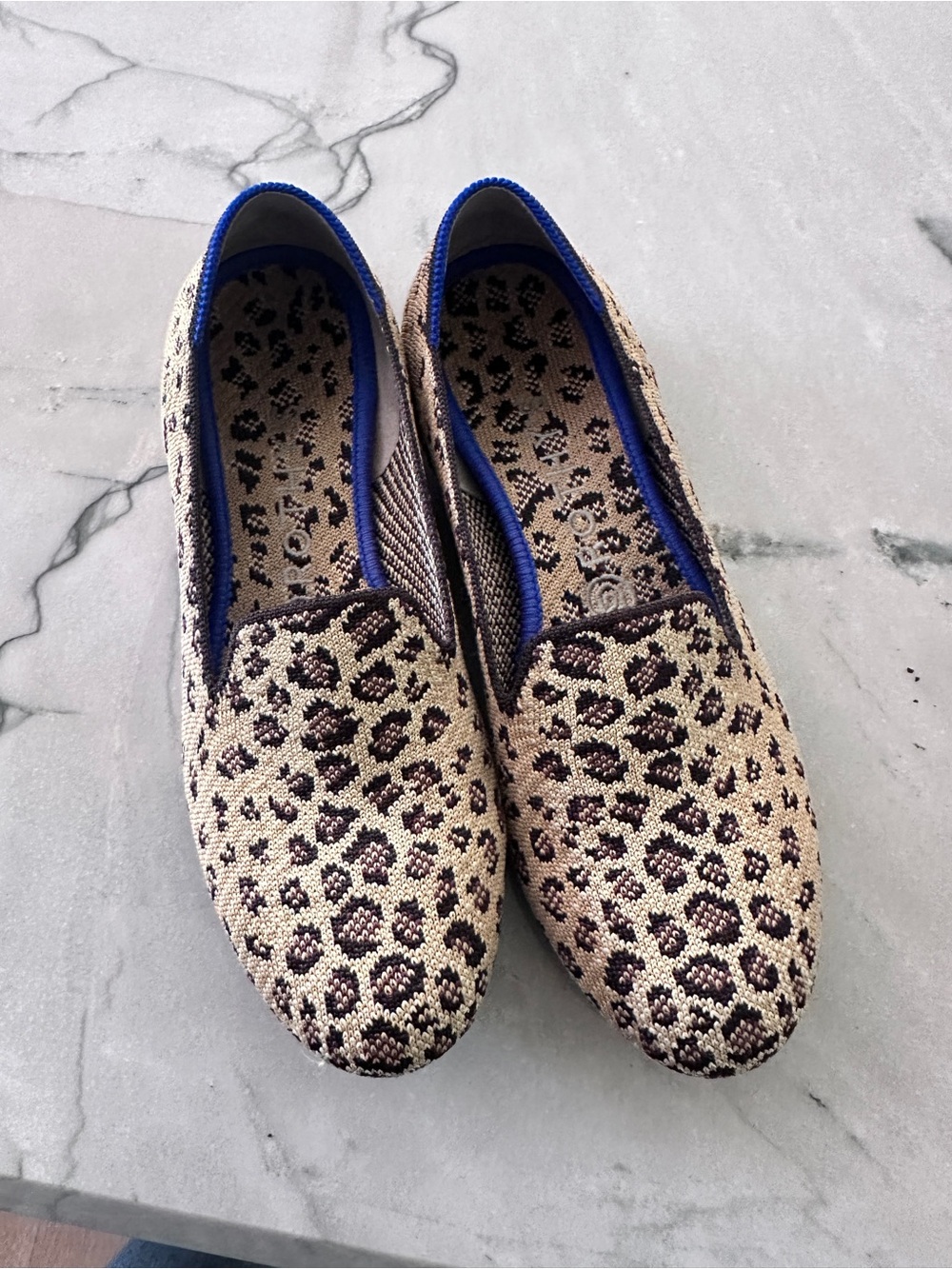 Rothy's women’s Leopard Print Slip-Ons in Beige, Brown & Blue Trim